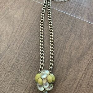 Vintage elegant gold necklace with a multi stone pendant